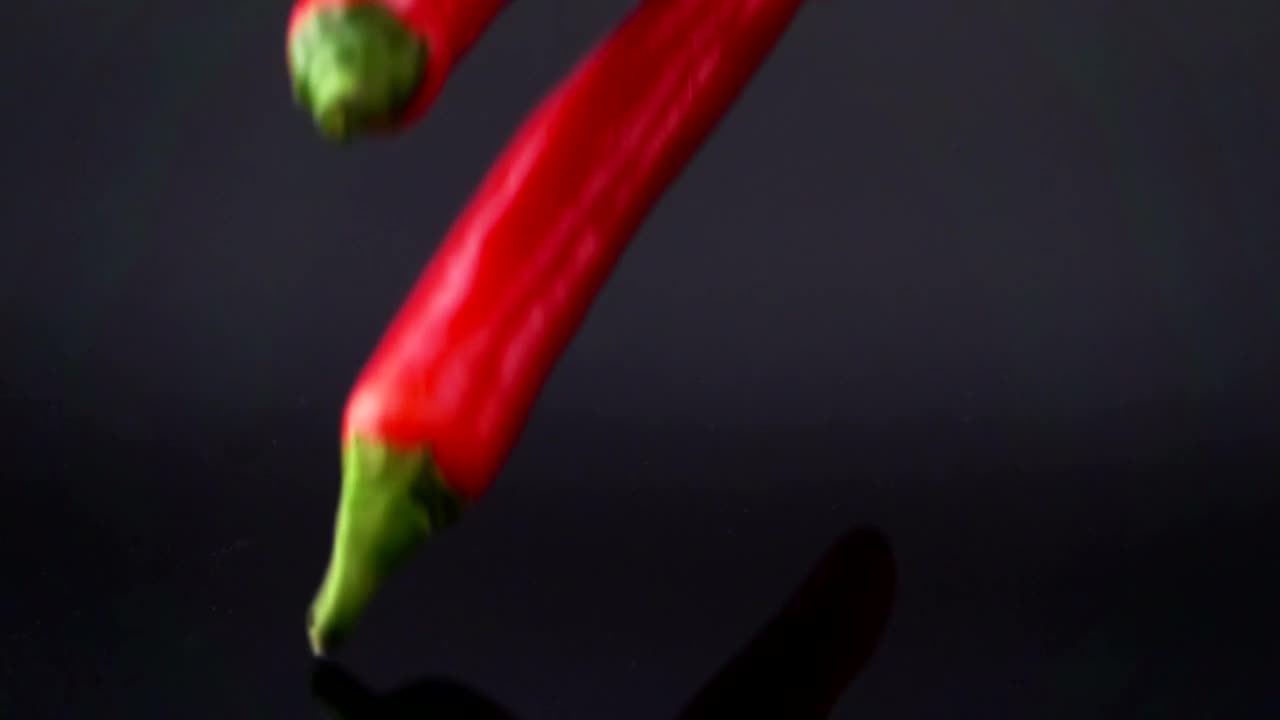 Video Stock Red Chili Pepper Falling Into Black Water Live Wallpaper Free - Free Download