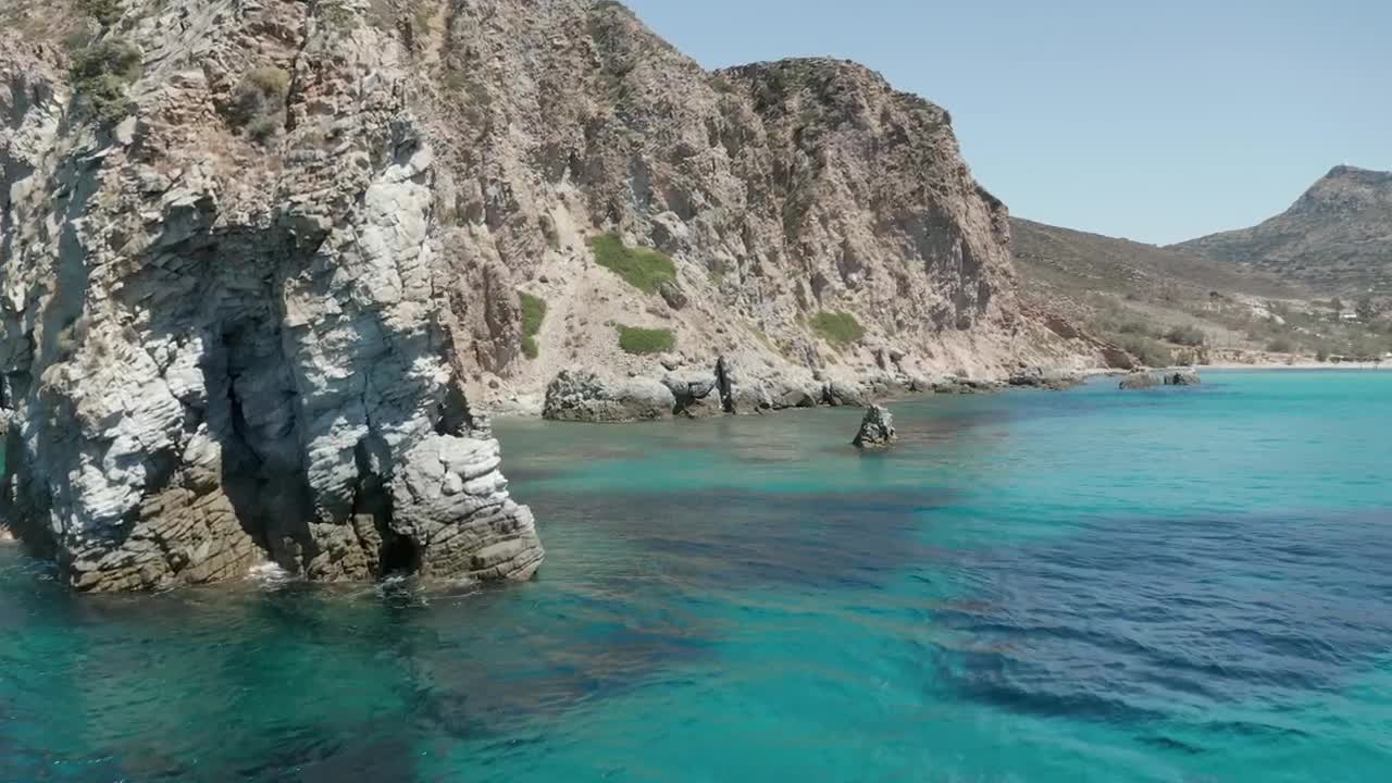 Free Stock Video Rocky Shoreline With A Turquoise Blue Sea Live Wallpaper - Free Download