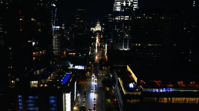Stock Video Mixkit Flying Over A Large Avenue In A City At Night Smal Live Wallpaper For PC - Free Download
