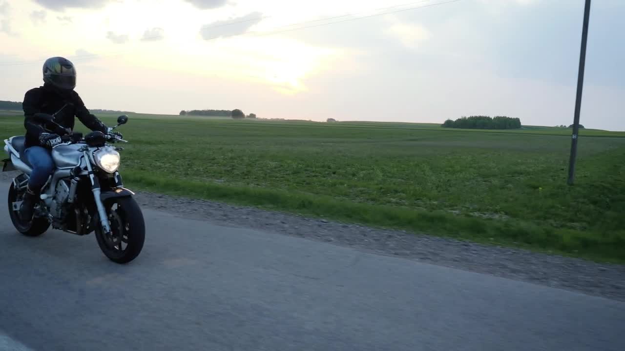 Stock Video Biker Driving On The Road In The Countryside Live Wallpaper For PC - Free Download