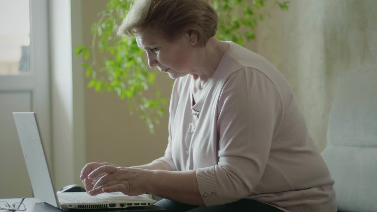 Stock Video Elderly Woman Working From Home Live Wallpaper For PC - Free Download
