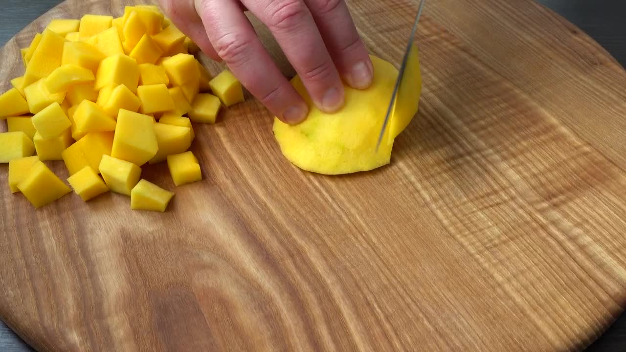 Stock Video Cutting Mango Cubes On A Board Live Wallpaper For PC - Free Download