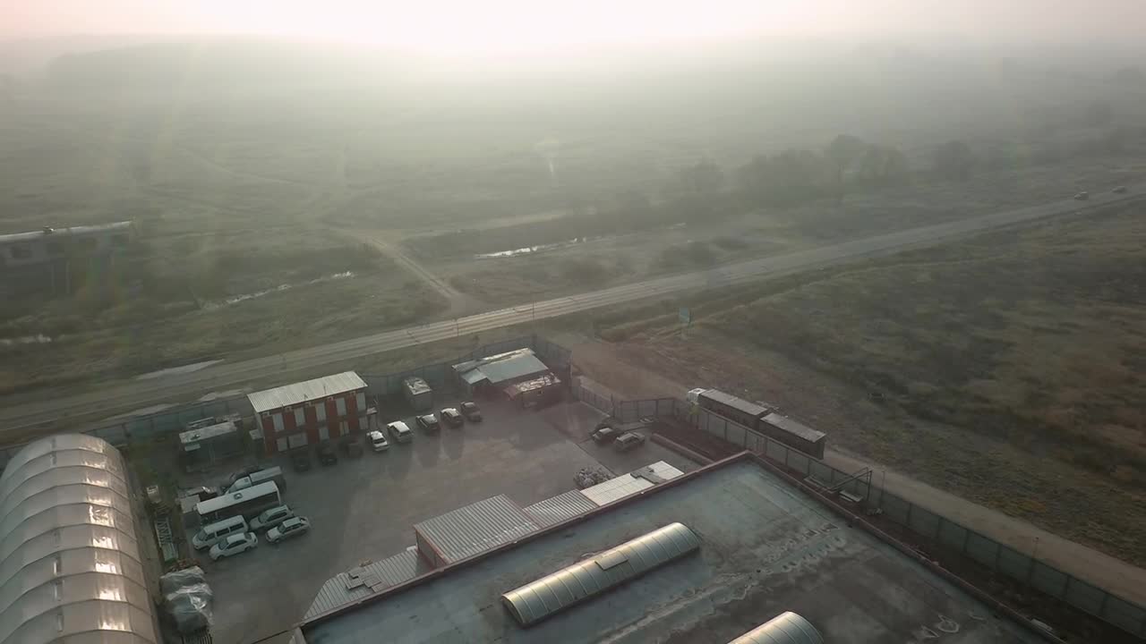 Free Video Stock traffic driving by a warehouse Live Wallpaper - Free Download