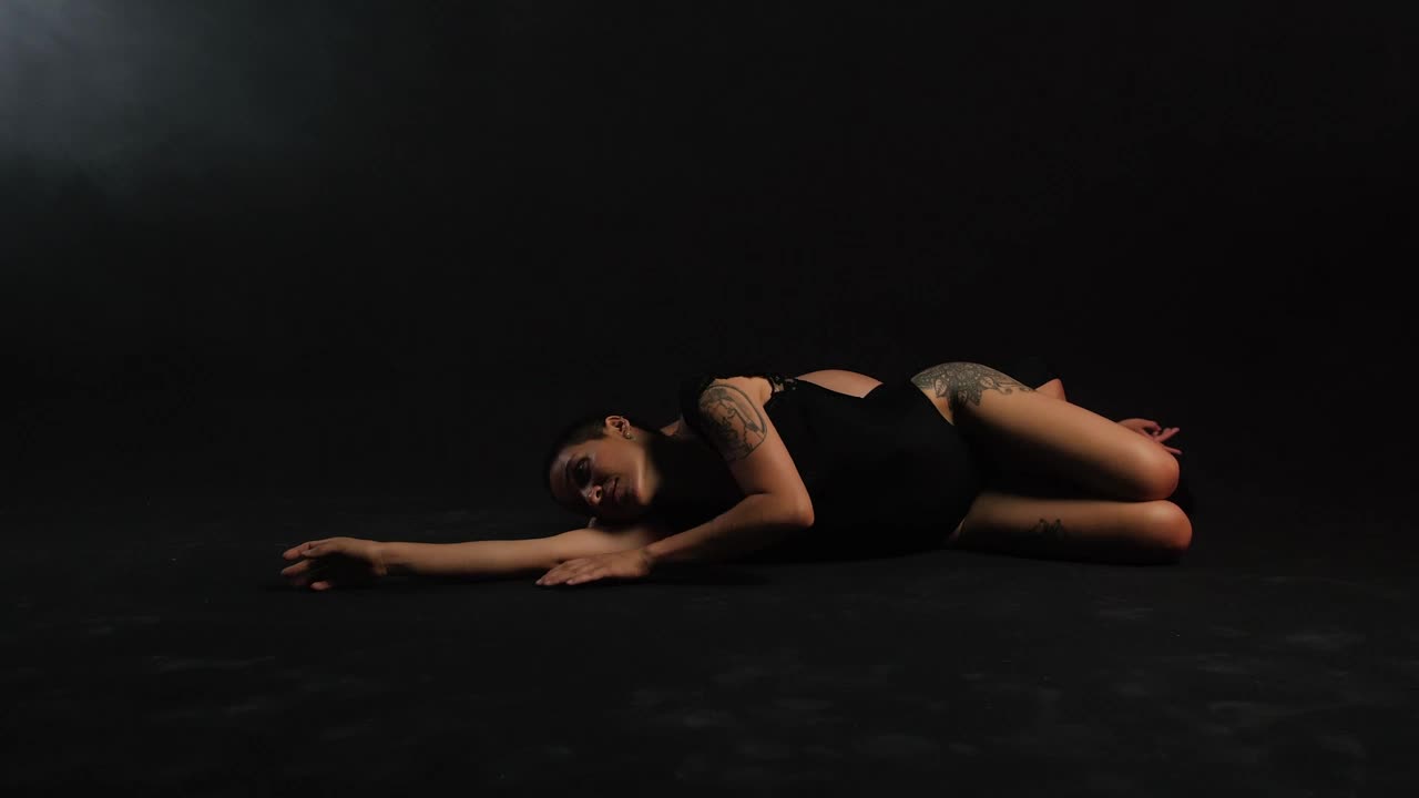 Free Stock Video Two Ballerinas Lying On The Floor On A Black Background Live Wallpaper - Free Download