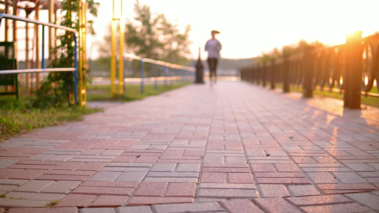 Stock Video Girl Running During Sunset Ties Her Shoelaces Live Wallpaper For PC - Free Download