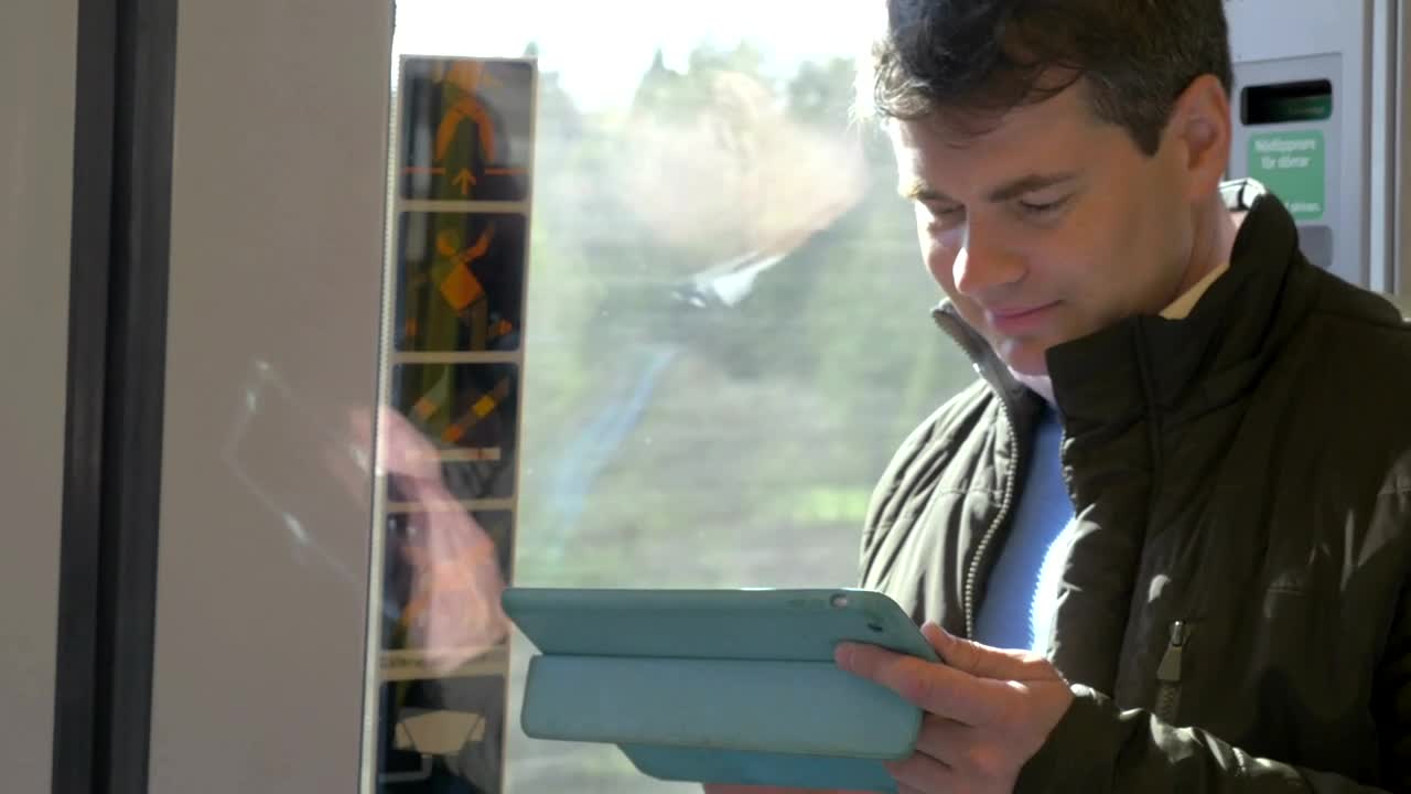 Free Video Stock Standing On A Train With A Tablet Live Wallpaper - Free Download