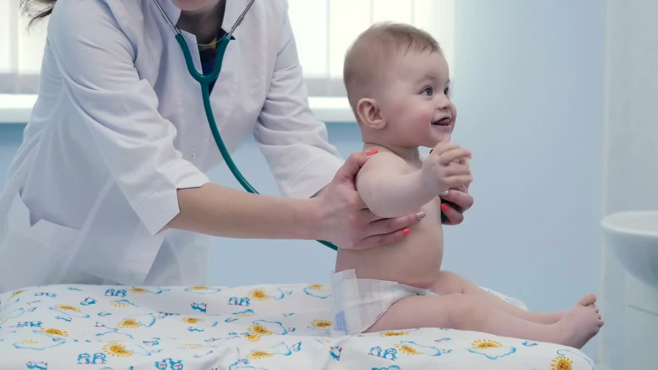 Stock Video Female Doctor Listening To A Baby With A Stethoscope Live Wallpaper For PC - Free Download