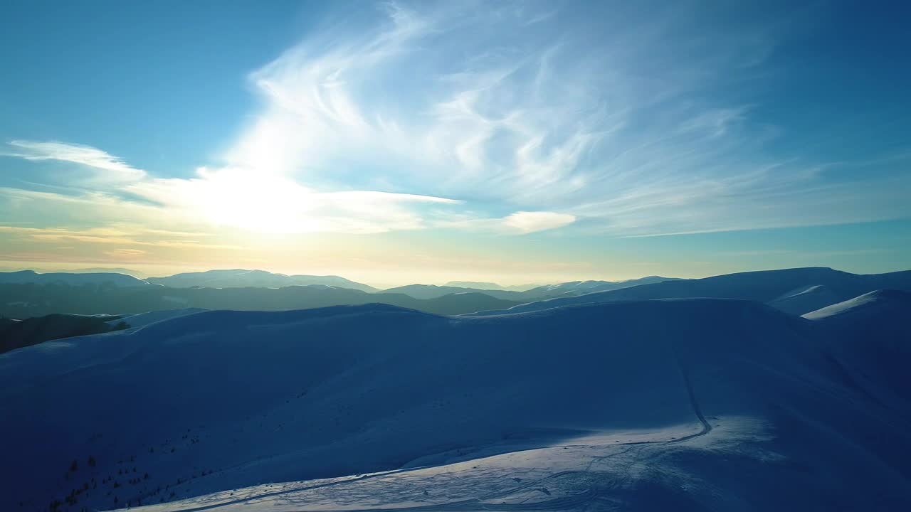 Stock Video Evening Sun Illuminating Snowy Mountains Live Wallpaper For PC - Free Download