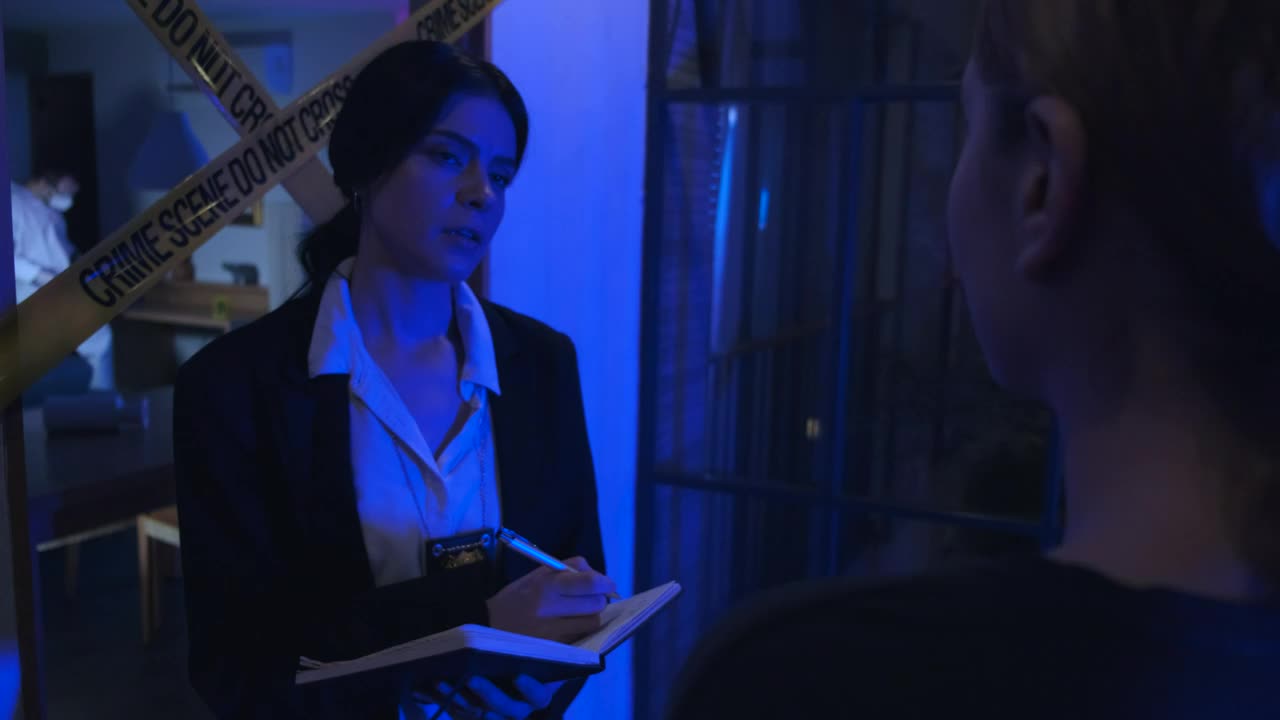 Stock Video Female Police Officer Interrogating A Person At A Crime Scene Live Wallpaper For PC - Free Download