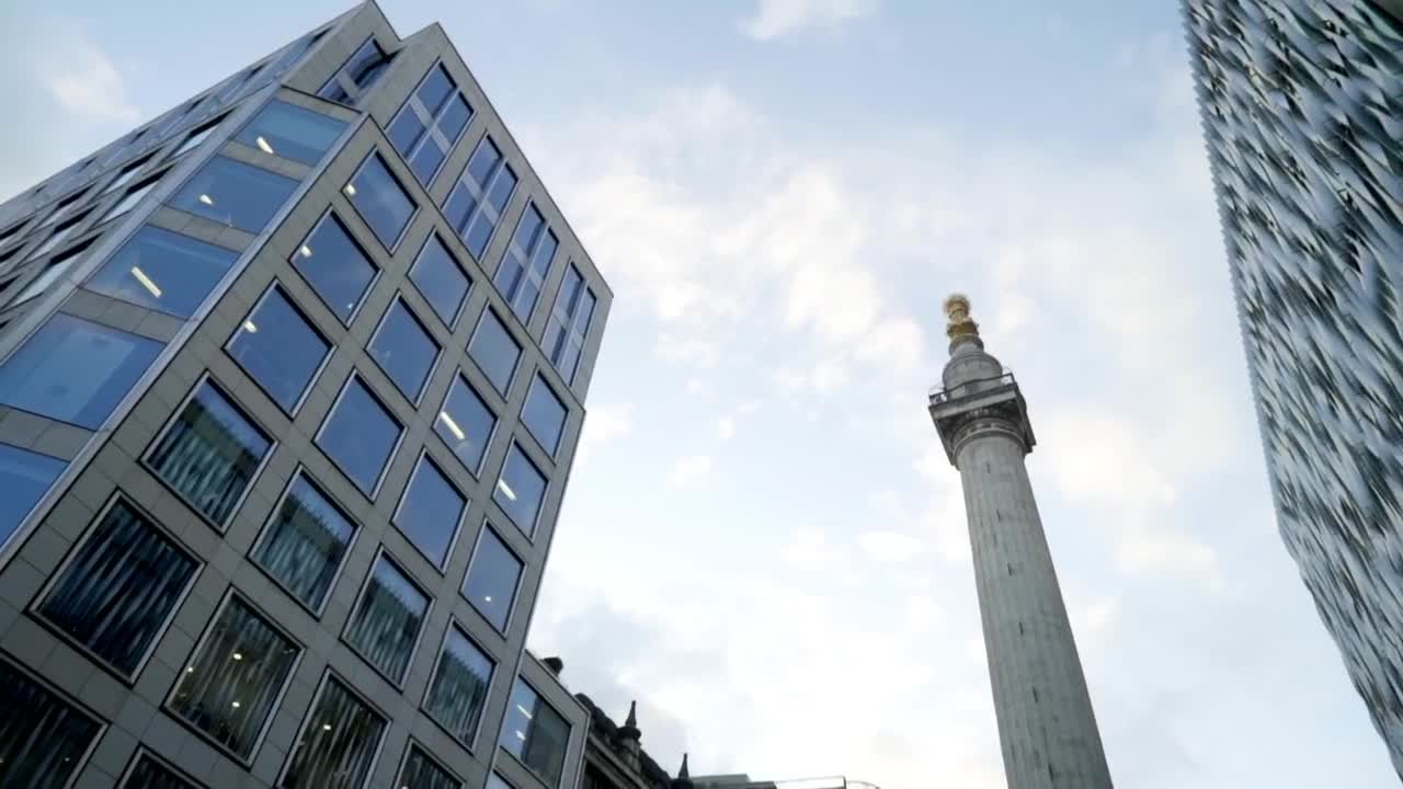 Stock Video Monument Between Two Building Animated Wallpaper - Free Download