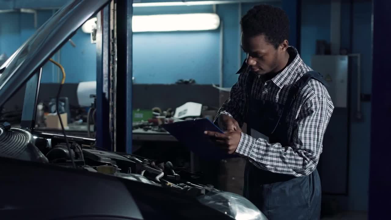 Stock Video Mechanic Checking A Car Moto Animated Wallpaper - Free Download