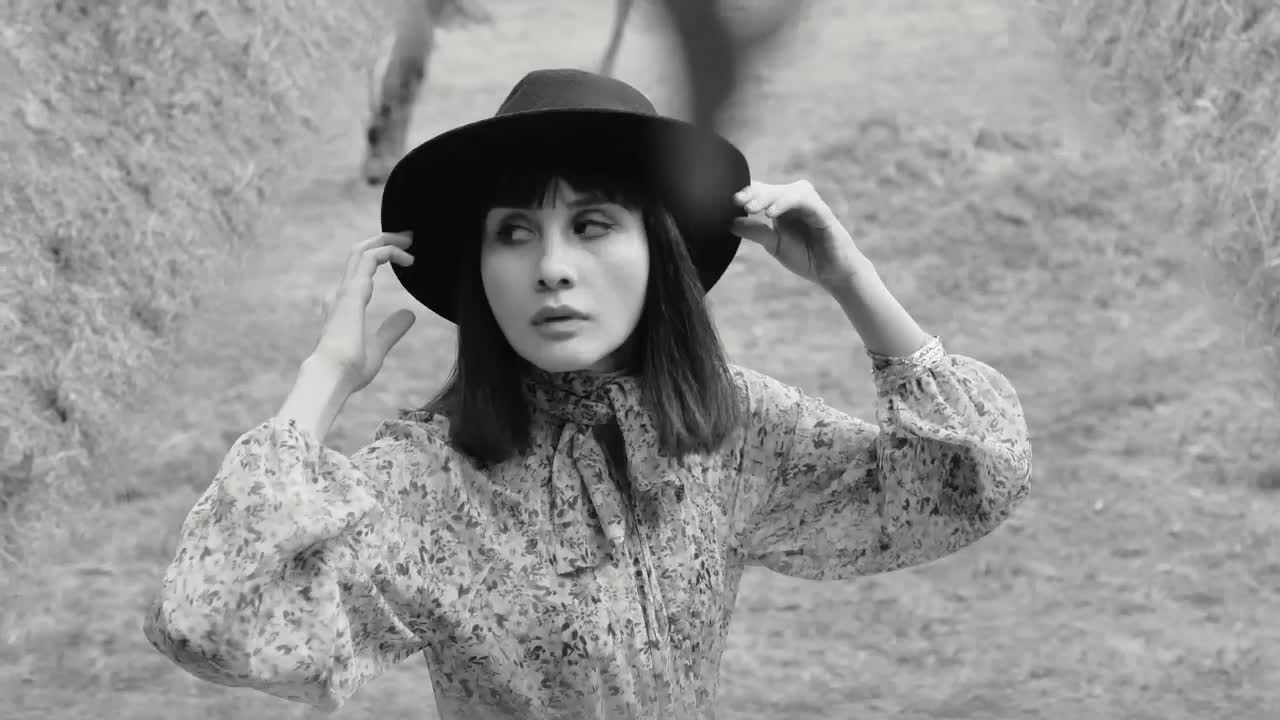 Stock Video Girl In A Forest Arranging Her Hat In Black And Live Wallpaper For PC - Free Download