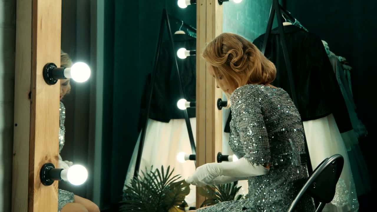 Free Video Stock tired actress removing her gloves after the show Live Wallpaper - Free Download