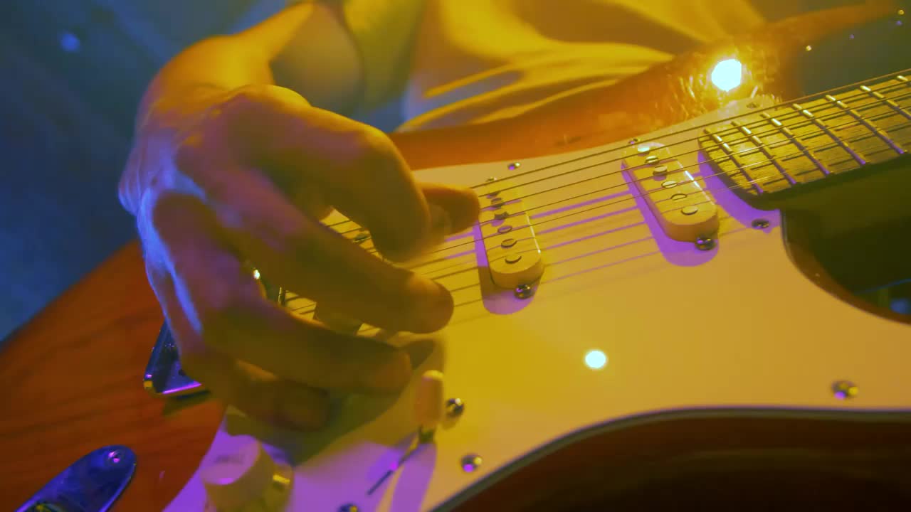 Stock Video Guitarist Plays And Moves His Electric Guitar Live Wallpaper For PC - Free Download