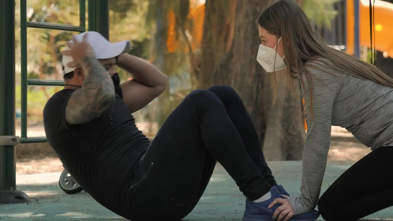 Stock Video Couple Exercising In The Park Live Wallpaper For PC - Free Download