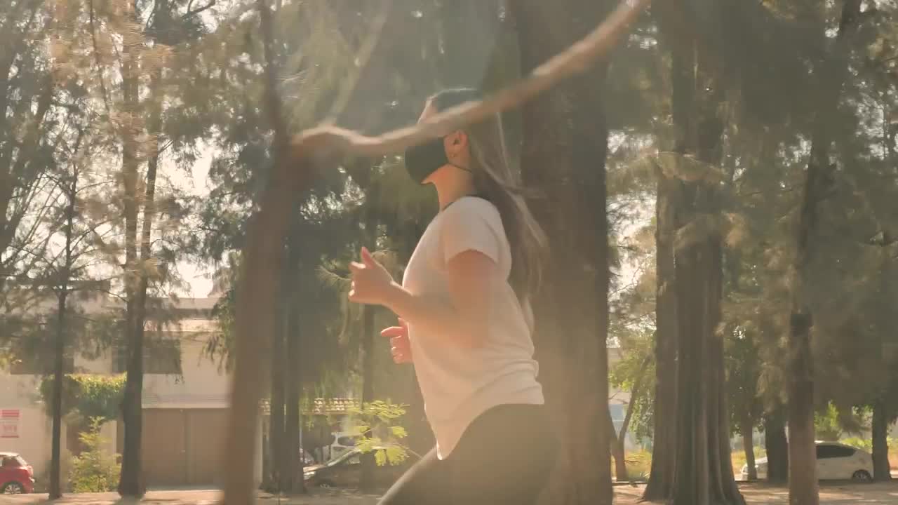Free Stock Video Woman Running With Face Mask In A Park Live Wallpaper - Free Download