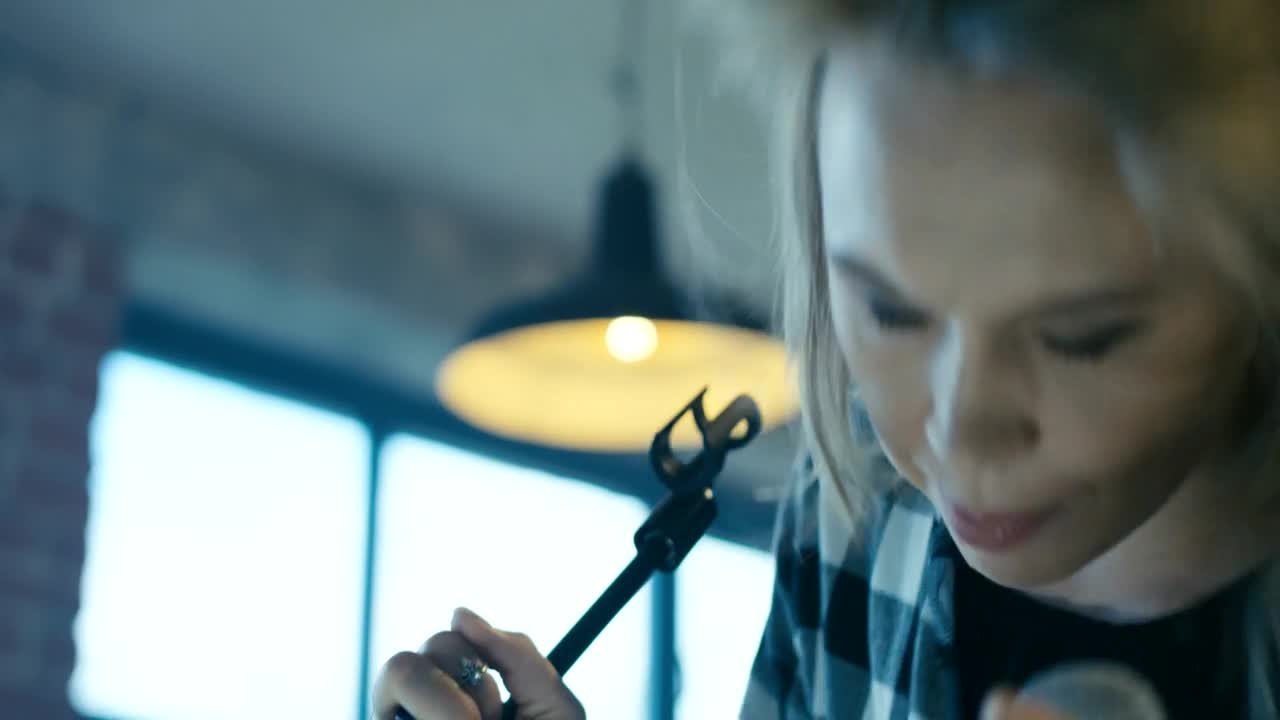 Stock Video Expressive Blonde Girl Singing With Microphone Live Wallpaper For PC - Free Download