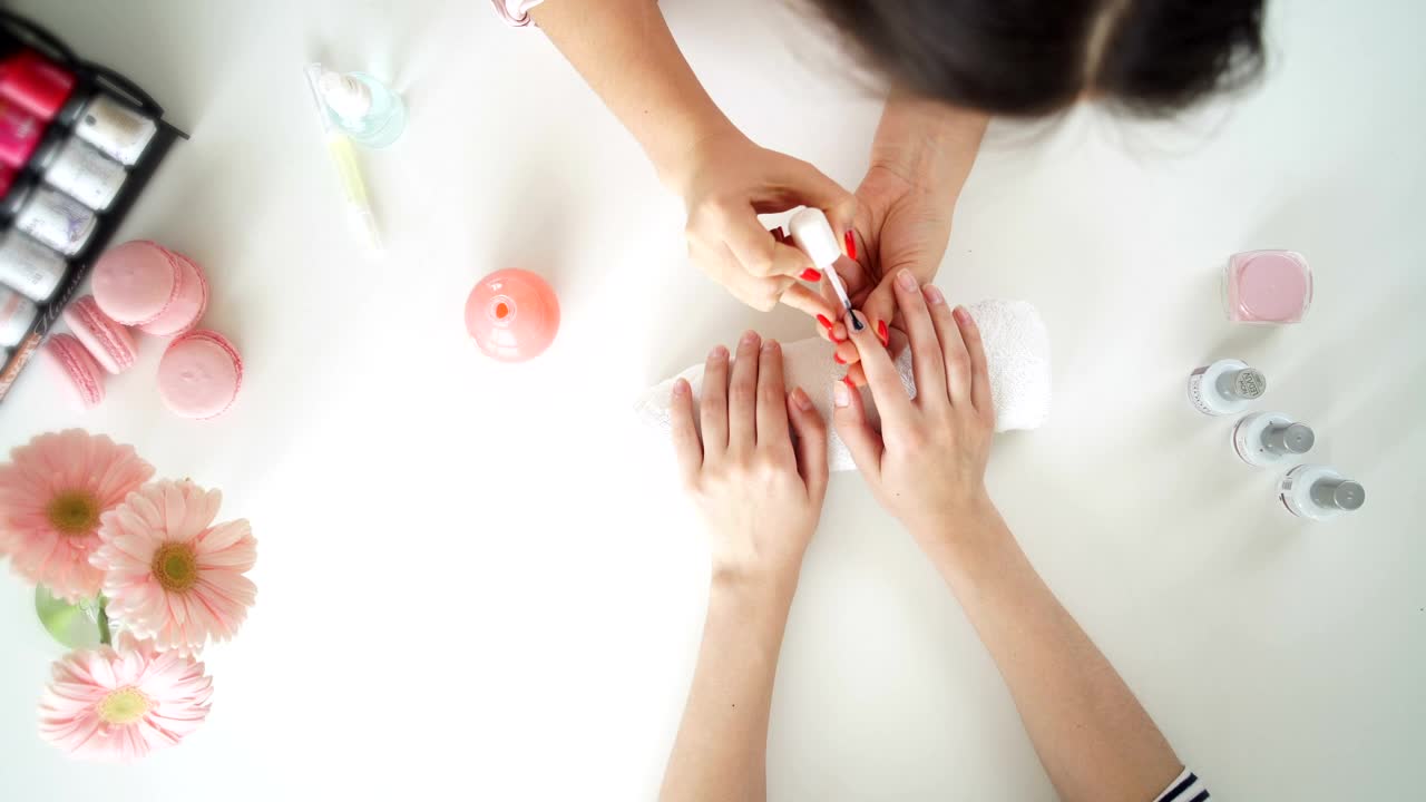 Free Video Stock top view of manicure nail painting timelapse Live Wallpaper - Free Download