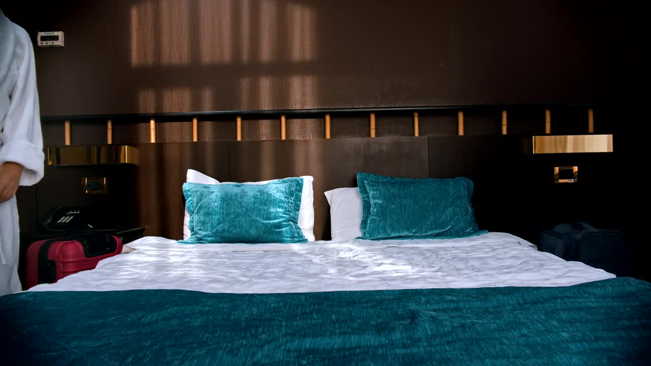 Free Video Stock tired family in bathrobes in an hotel room Live Wallpaper - Free Download