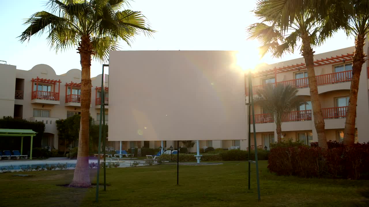 Free Video Stock Sun Flare Behind A Blank Advertisement Live Wallpaper - Free Download