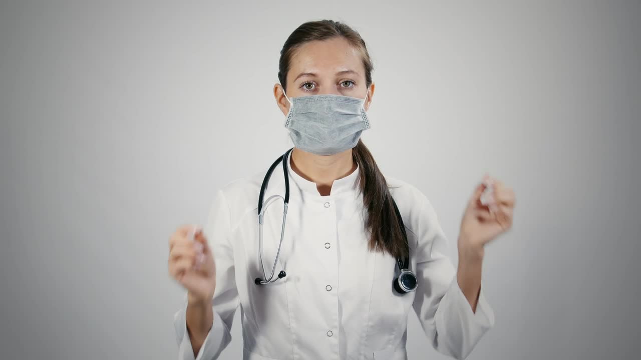 Stock Video Doctor Puts Off A Medical Mask Live Wallpaper For PC - Free Download