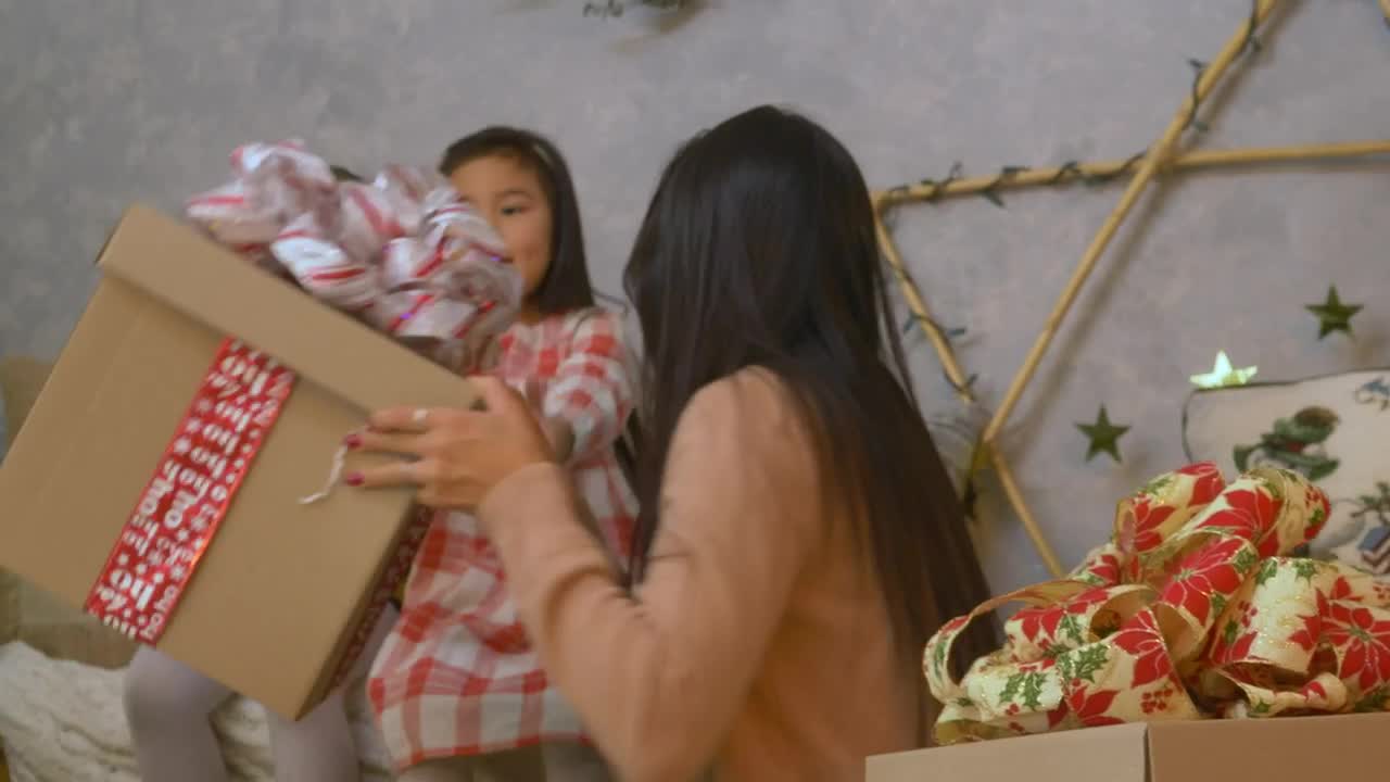 Stock Video Mother And Daughters Opening Presents On Christmas Da Animated Wallpaper - Free Download