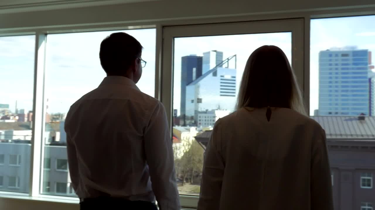 Stock Video Colleagues Looking Out Of A Window Live Wallpaper For PC - Free Download