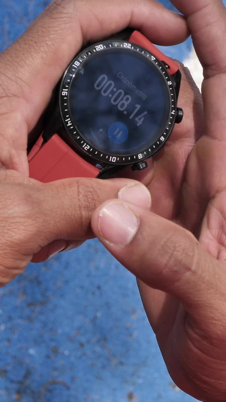 Stock Video Hands Holding A Smart Watch With The Stopwatch Running Animated Wallpaper - Free Download
