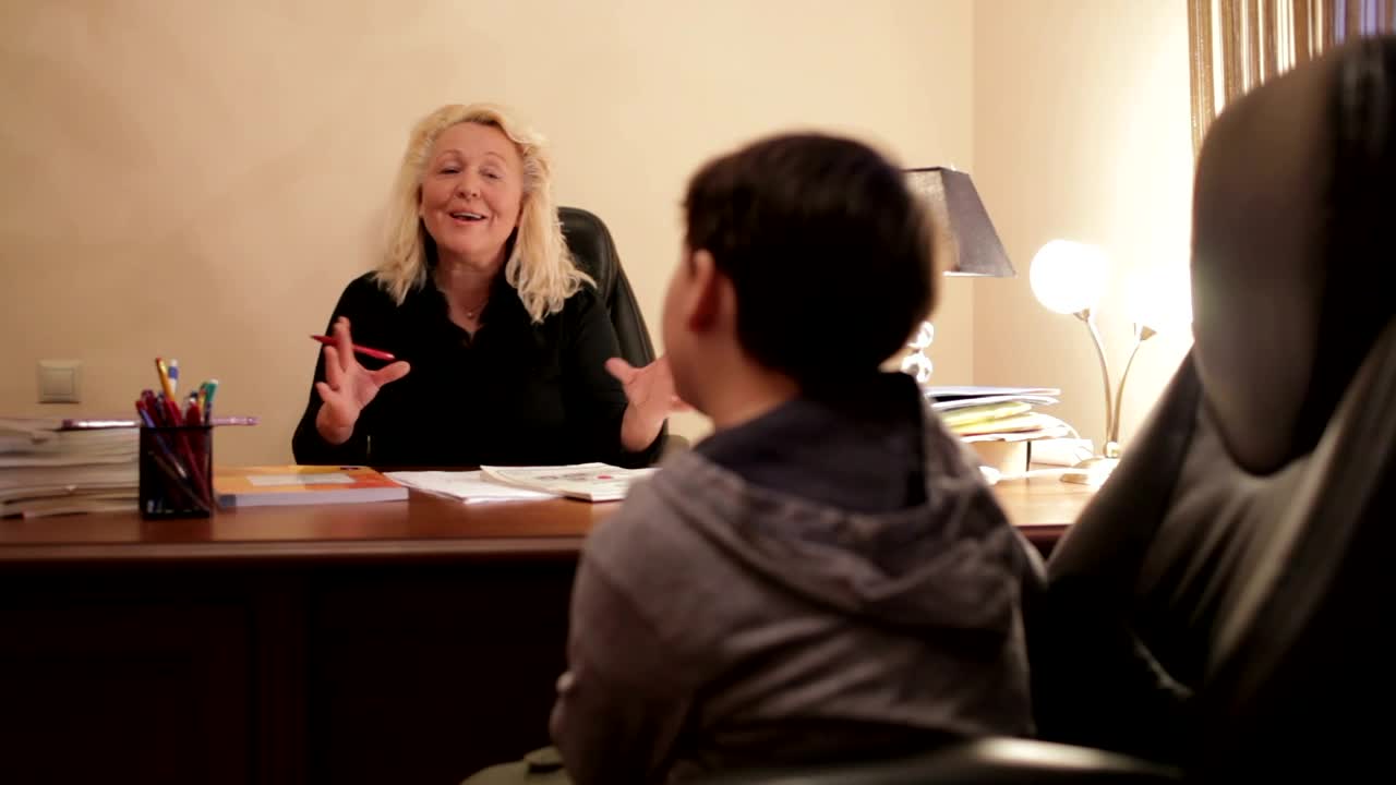 Free Video Stock teacher speaking to a young student Live Wallpaper - Free Download