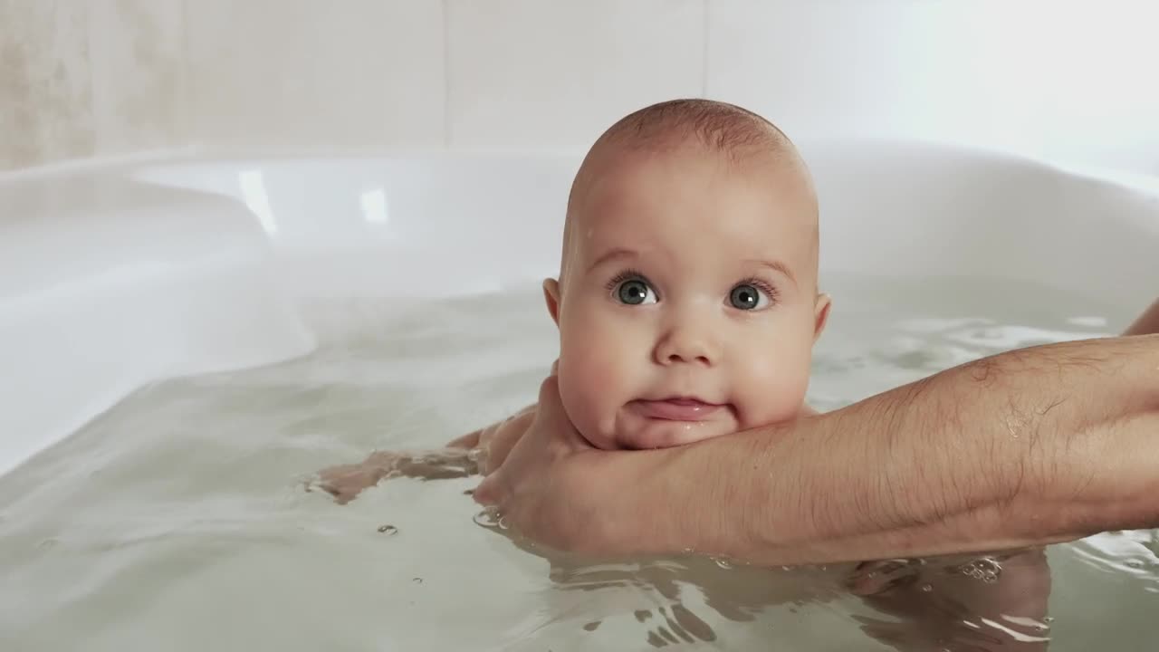 Stock Video Happy Baby Being Bathed By His Mother Animated Wallpaper - Free Download