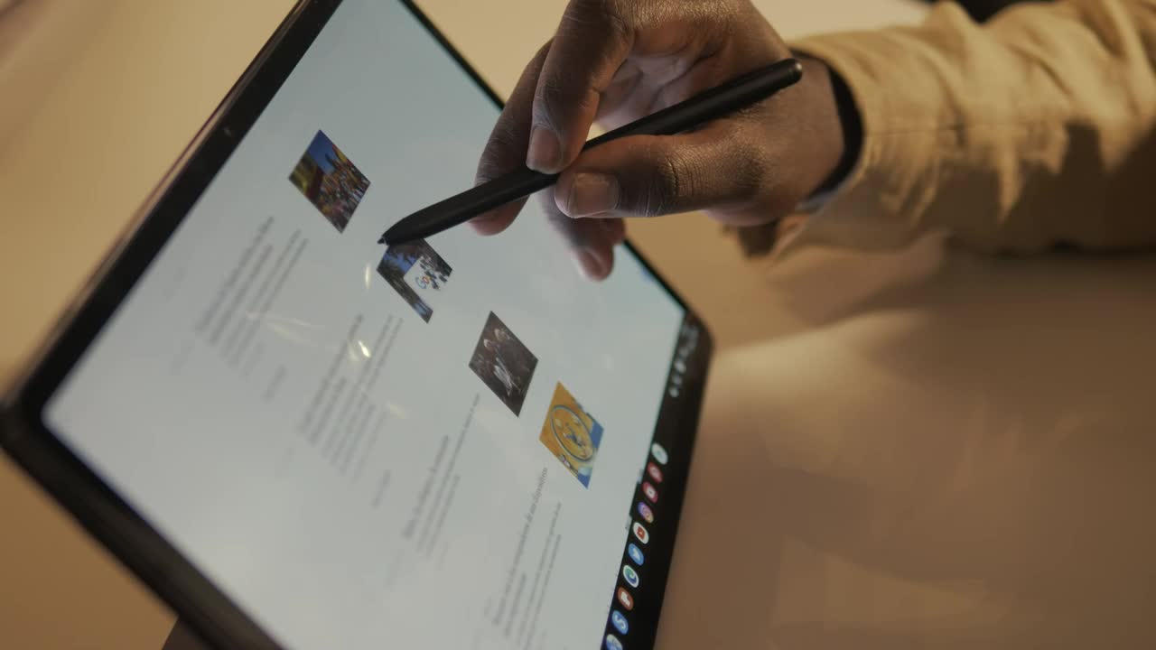 Stock Video Hand Of A Man Browsing The Internet On A Tablet Live Wallpaper For PC - Free Download