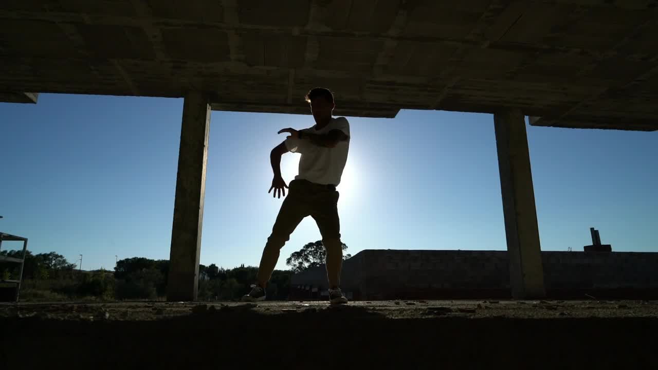 Free Stock Video Silhouette Of Man Dancing In An Abandoned Building Live Wallpaper - Free Download
