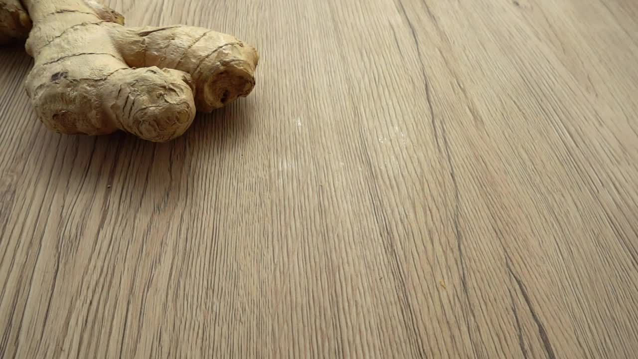 Stock Video Ginger Slices Falling On The Table Live Wallpaper For PC - Free Download