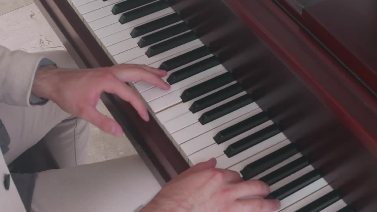 Stock Video Hands Of A Pianist Performing A Song On A Piano Animated Wallpaper - Free Download