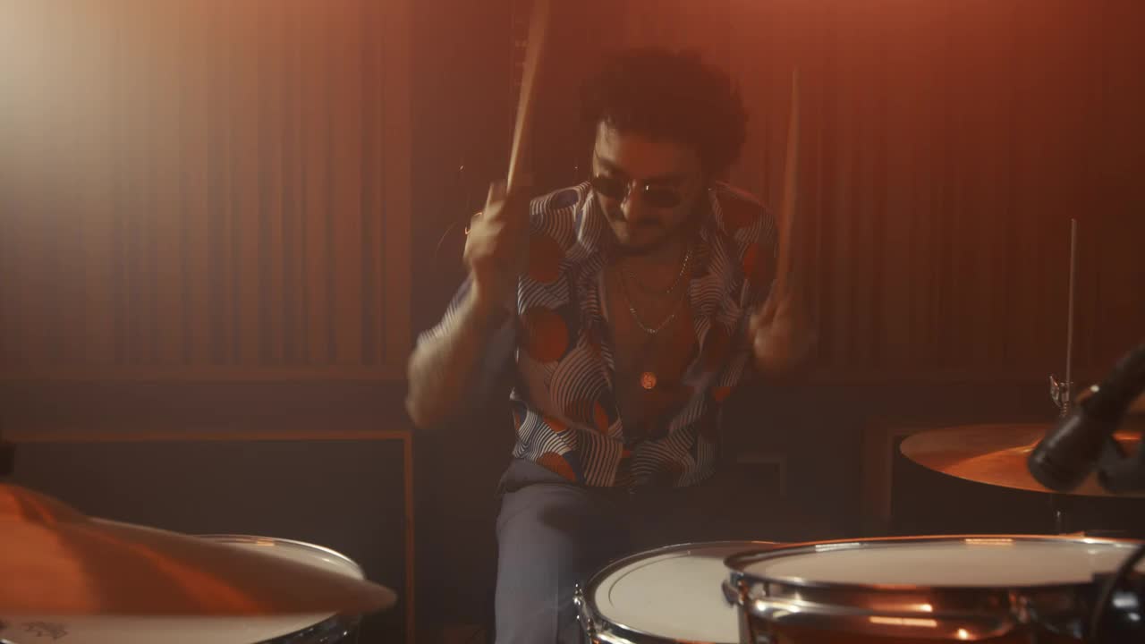 Free Video Stock talented drummer playing in a recording booth Live Wallpaper - Free Download