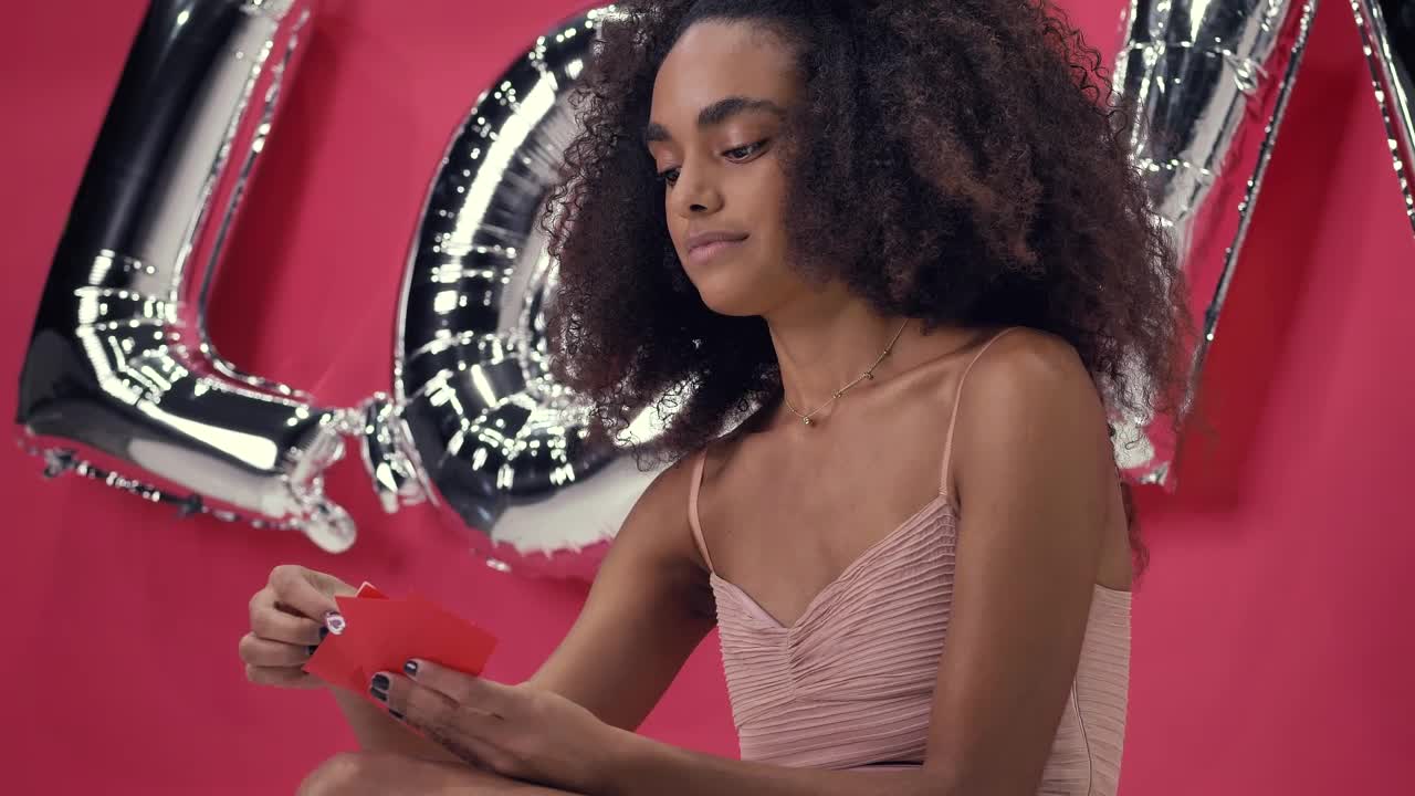 Stock Video Girl Opening A Letter Excited And Captivated On Valentines Day Live Wallpaper For PC - Free Download