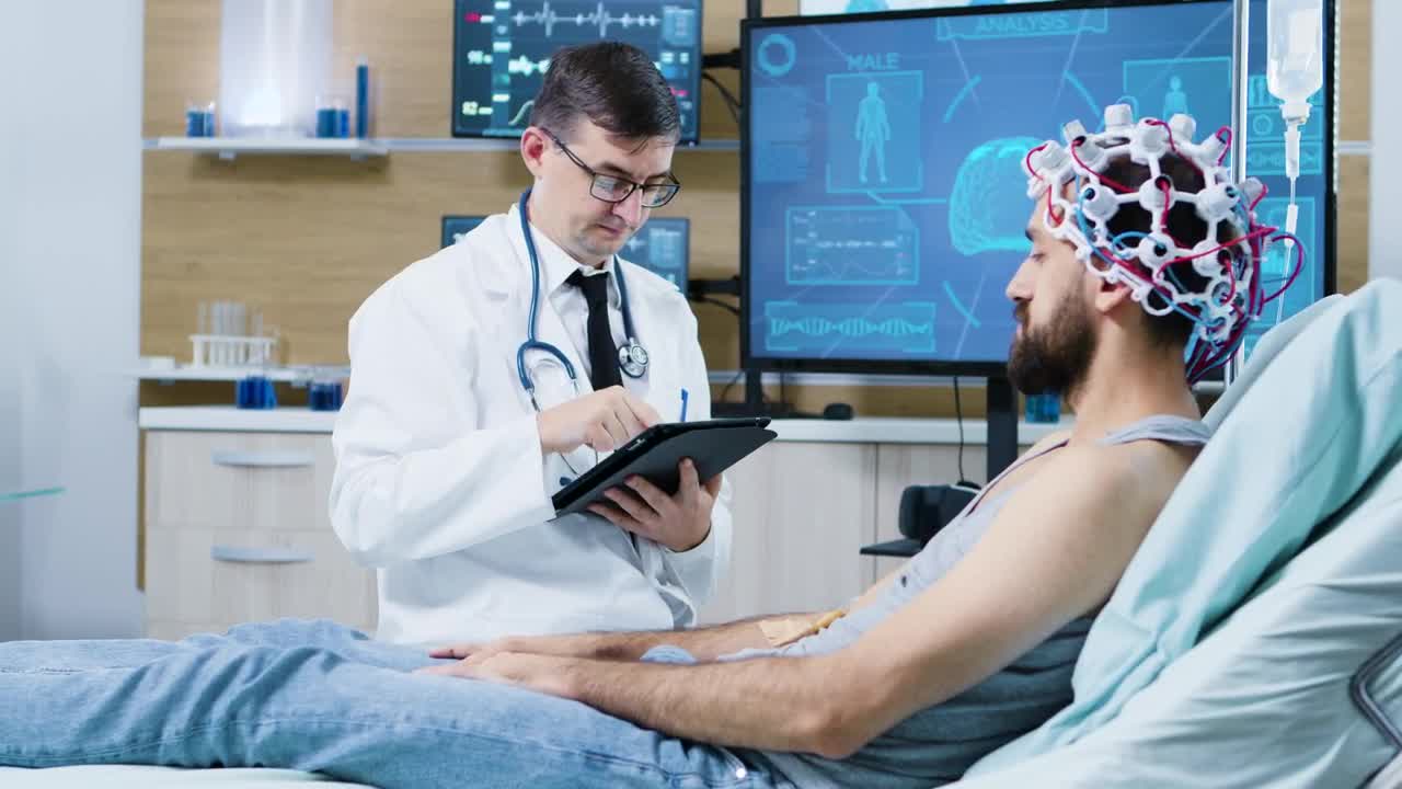Stock Video Doctor With Patient Reviews Brain Scan On Screen Live Wallpaper For PC - Free Download