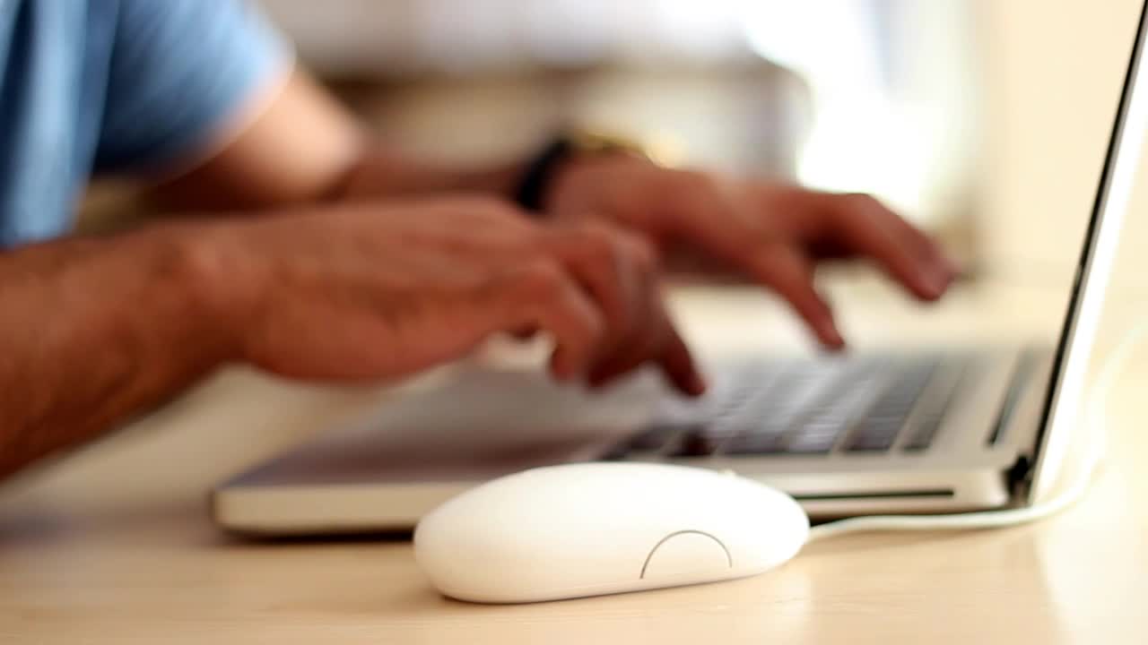 Free Stock Video Young Man Working On A Laptop With Mouse Live Wallpaper - Free Download