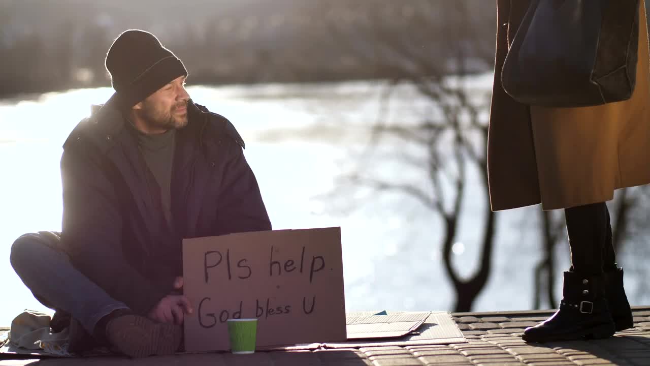 Free Stock Video Woman Sits Next To A Homeless Man And Shares Food Live Wallpaper - Free Download