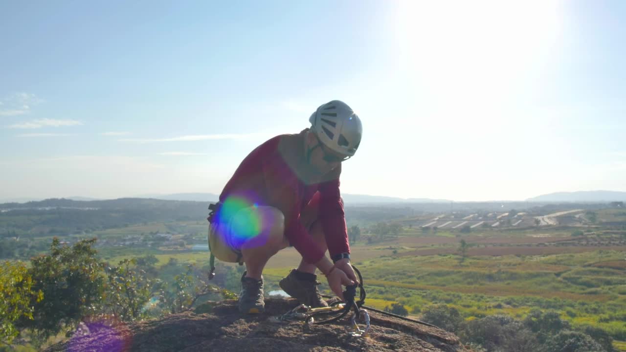 Stock Video Laying A Safety Rope On Top Of The Hill Animated Wallpaper - Free Download