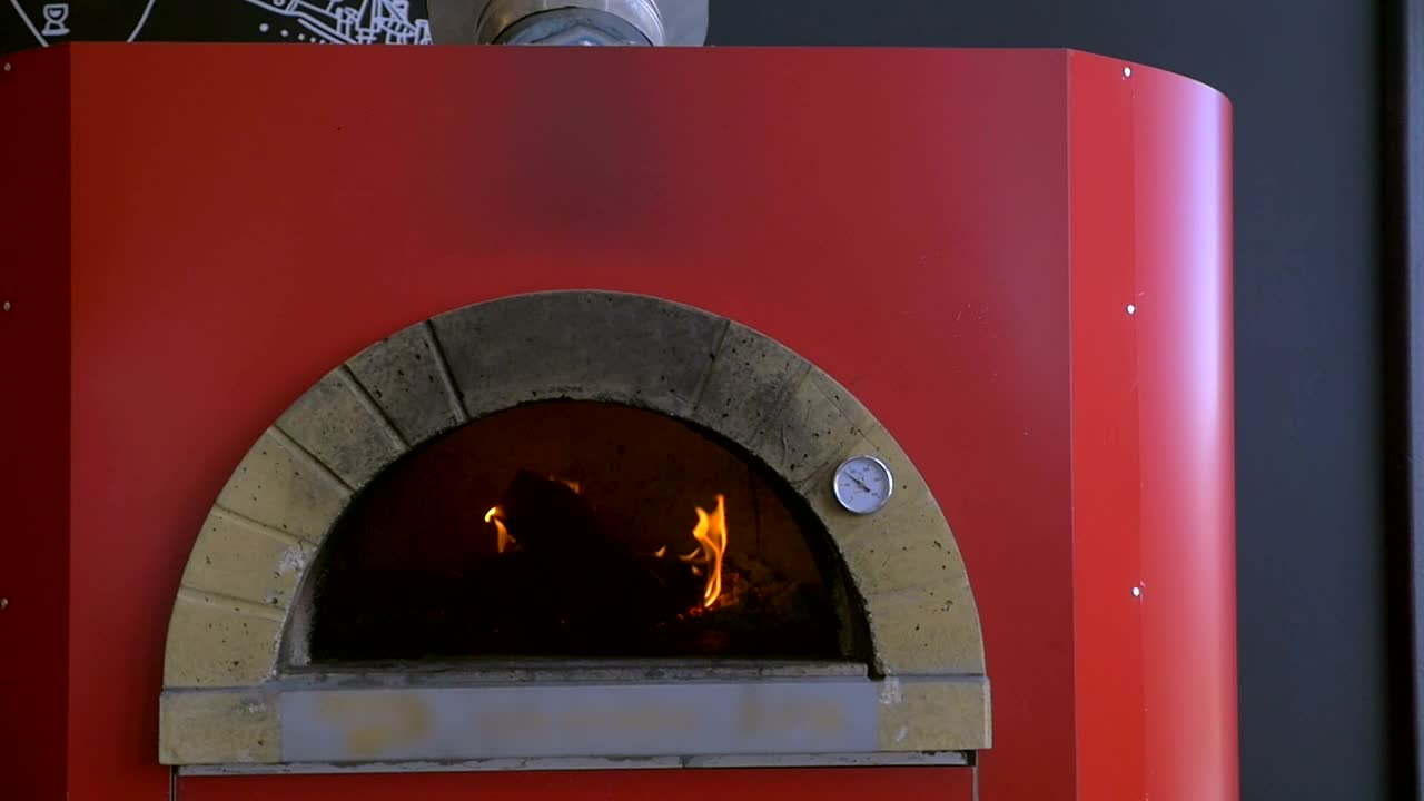 Video Stock Placing A Pizza In A Red Oven Live Wallpaper Free - Free Download