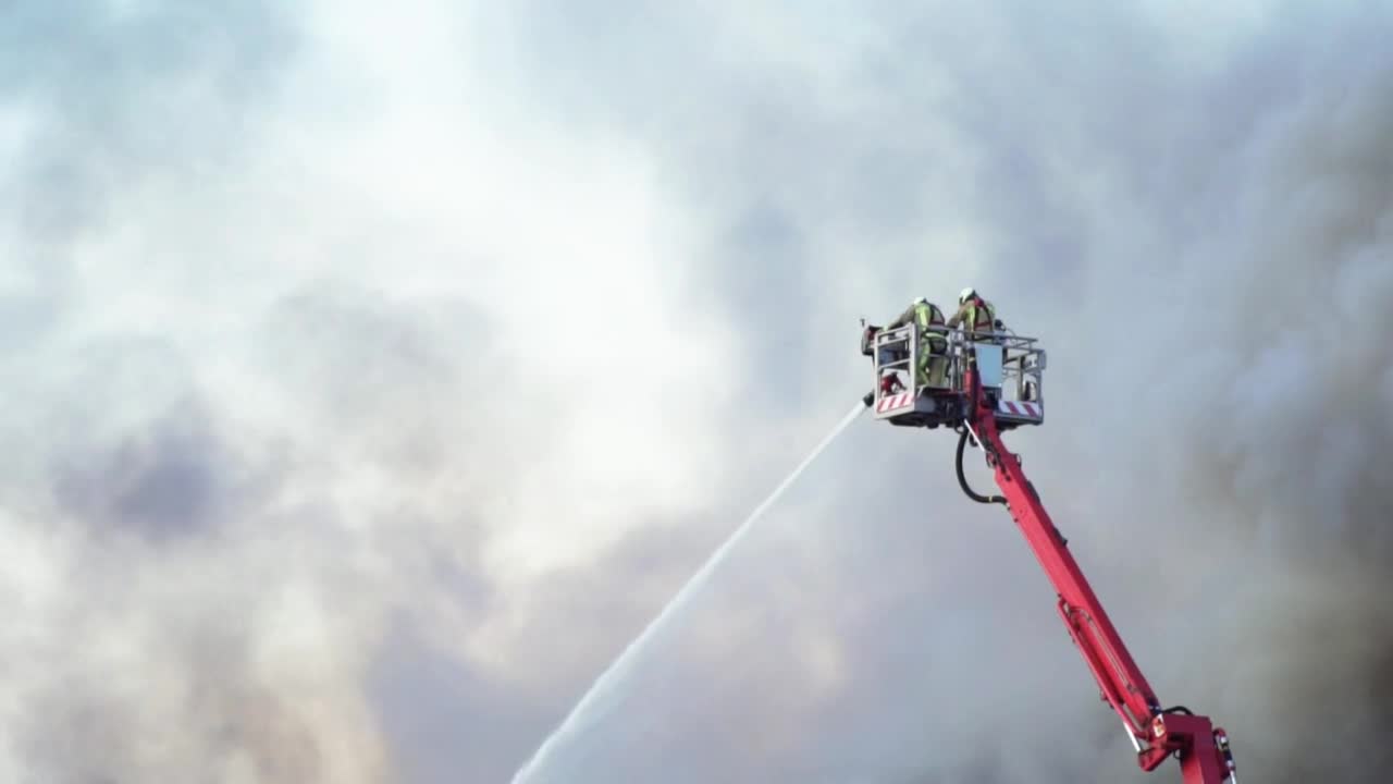 Stock Video Firefighters On A Crane Putting Out A Fire Live Wallpaper For PC - Free Download