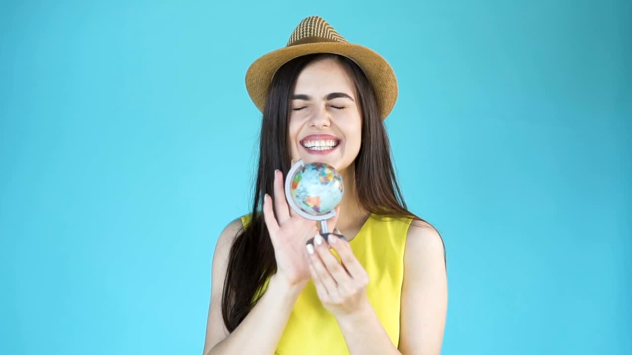 Stock Footage Woman Chooses A Country To Travel On A Globe Live Wallpaper - Free Download