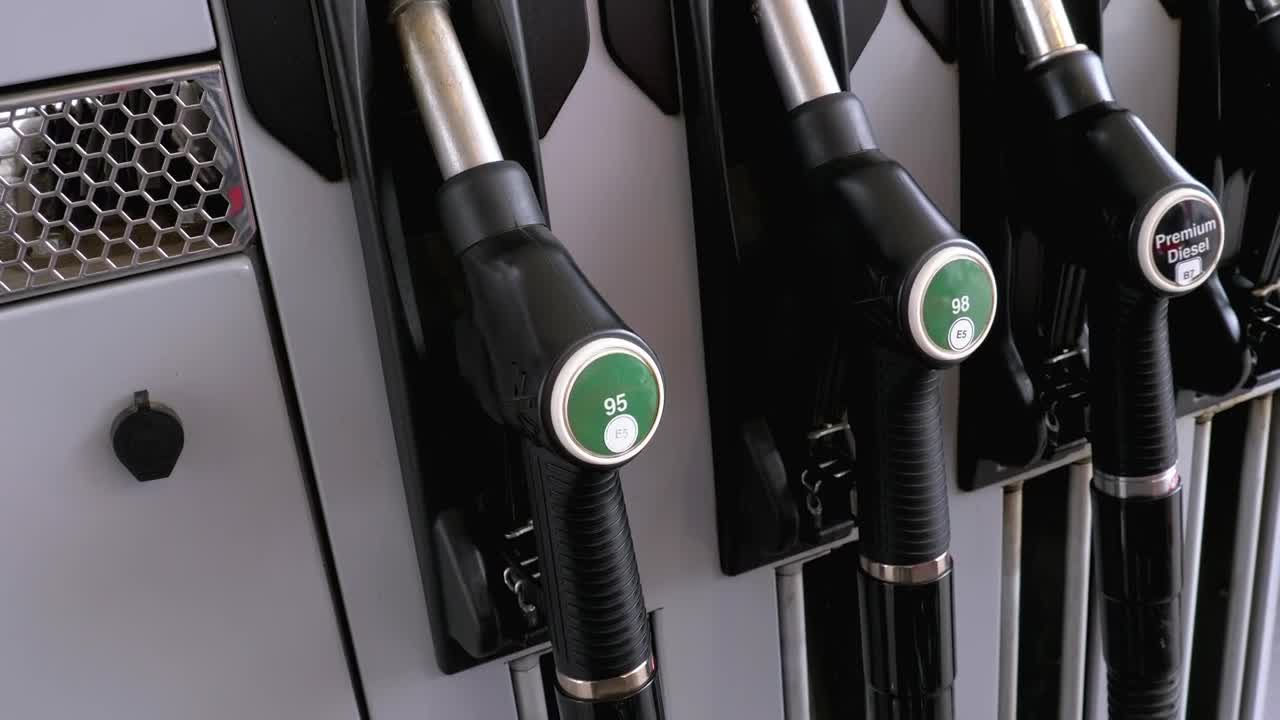 Stock Video Mans Hand Taking The Fuel Nozzle At The Gas Statio Animated Wallpaper - Free Download