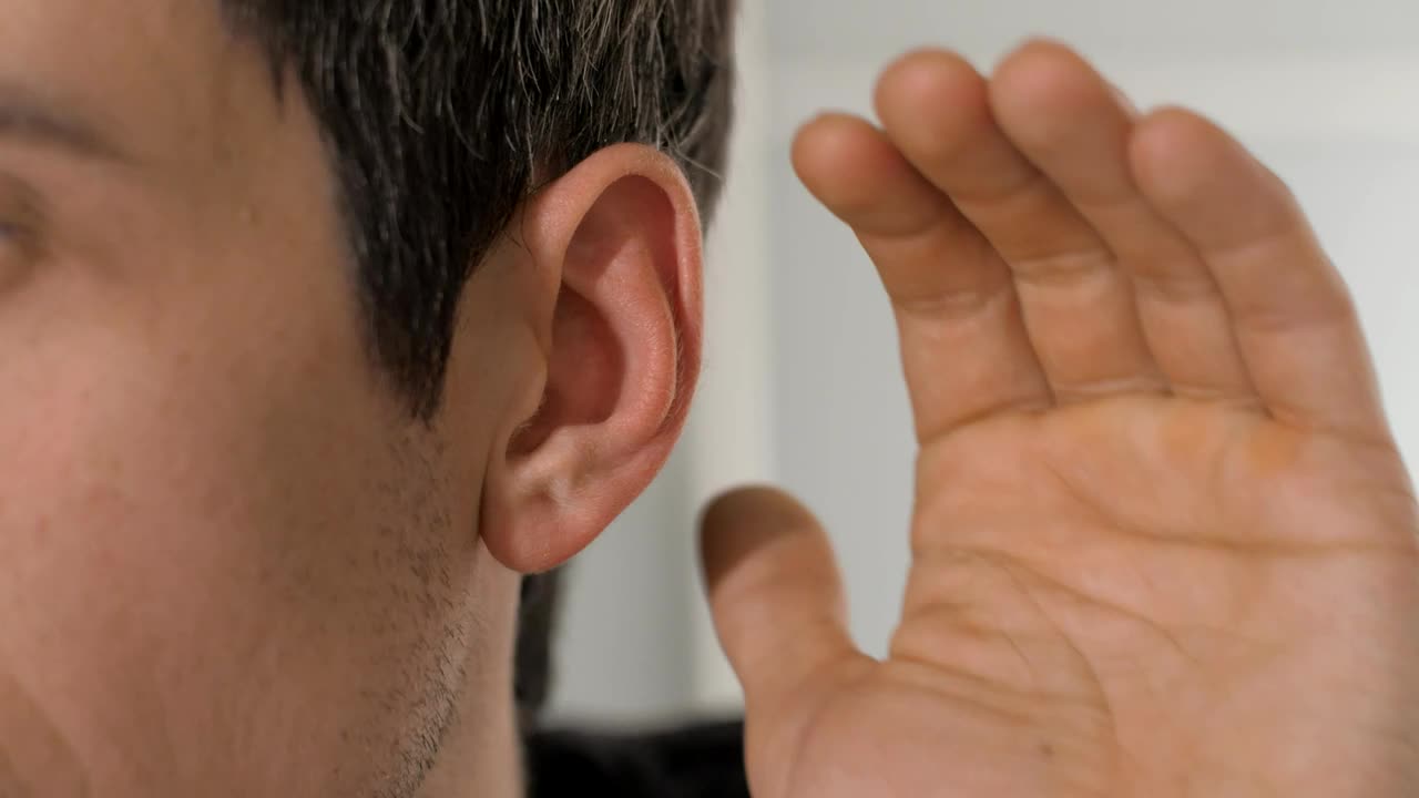 Stock Video Person Places His Hand On His Ear To Hear Better Live Wallpaper - Free Download