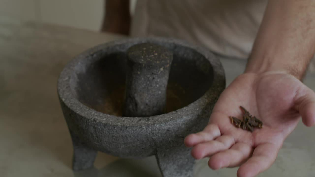 Stock Video Grinding Cinnamon In A Molcajete Live Wallpaper For PC - Free Download