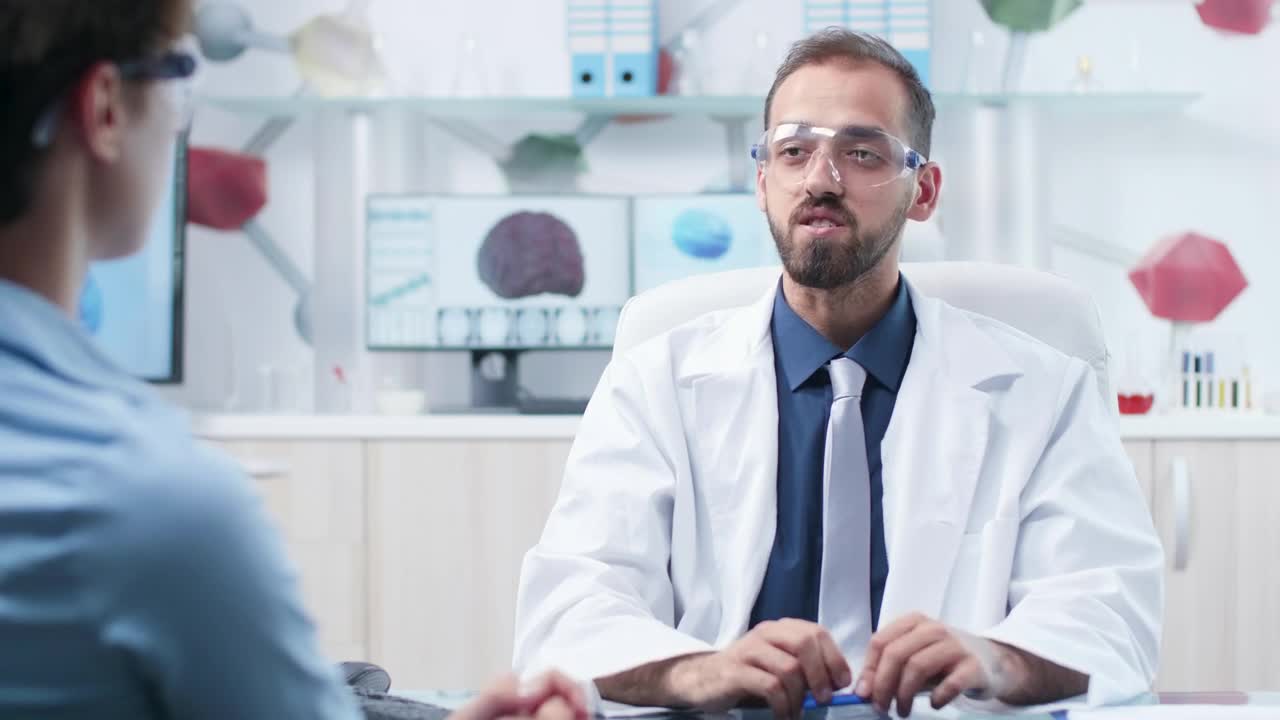 Free Stock Video Scientists Share Innovation Using Ar Tech In Modern Research Lab Live Wallpaper - Free Download