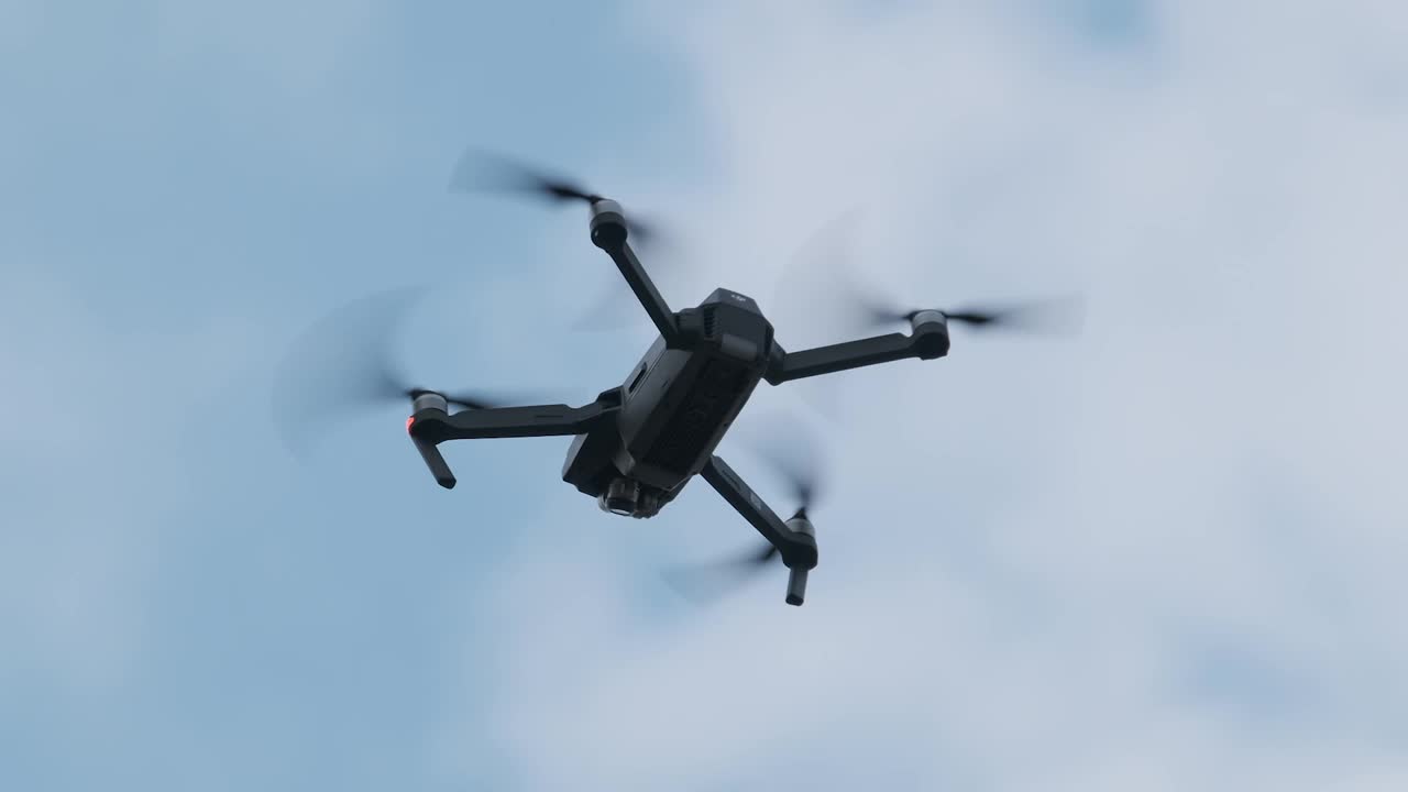 Stock Video Low View Of A Drone Flying Against The Sky Animated Wallpaper - Free Download