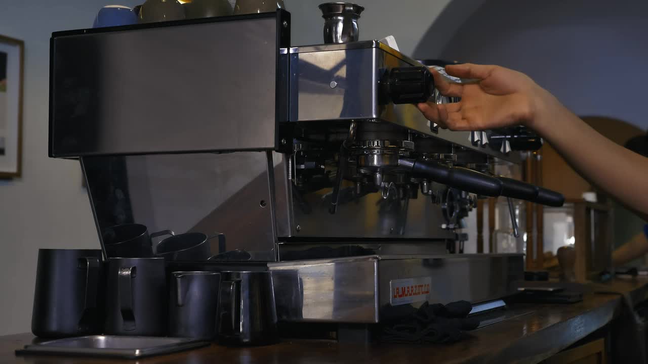 Stock Video Operating A Large Coffee Machine In A Coffee Shop LargeLive Wallpaper - Free Download