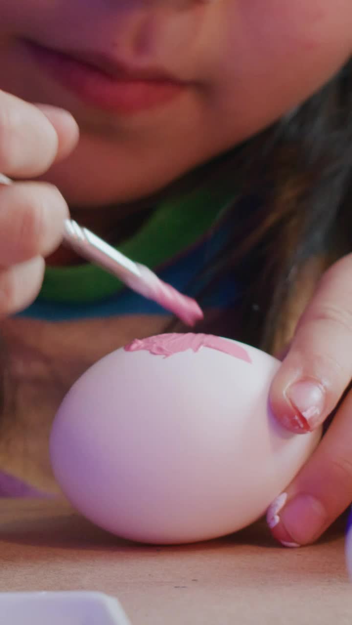 Stock Video Little Girl Paints Easter Eggs Close Up Animated Wallpaper - Free Download